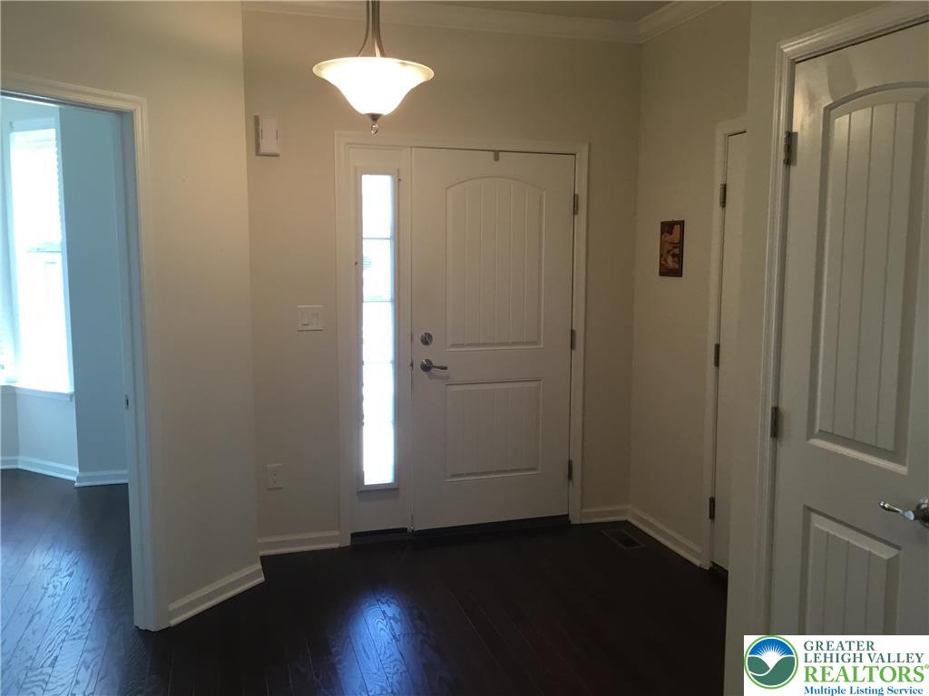 4088 Eveningstar Road Emmaus, PA 18049 - Photo 78 of 78 an empty room with wooden floor and windows