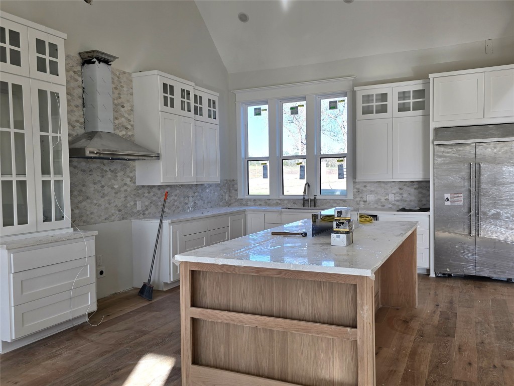 15408 Highlander Court Montgomery, TX 77356 - Photo 16 of 35 a kitchen with a cabinets and counter space