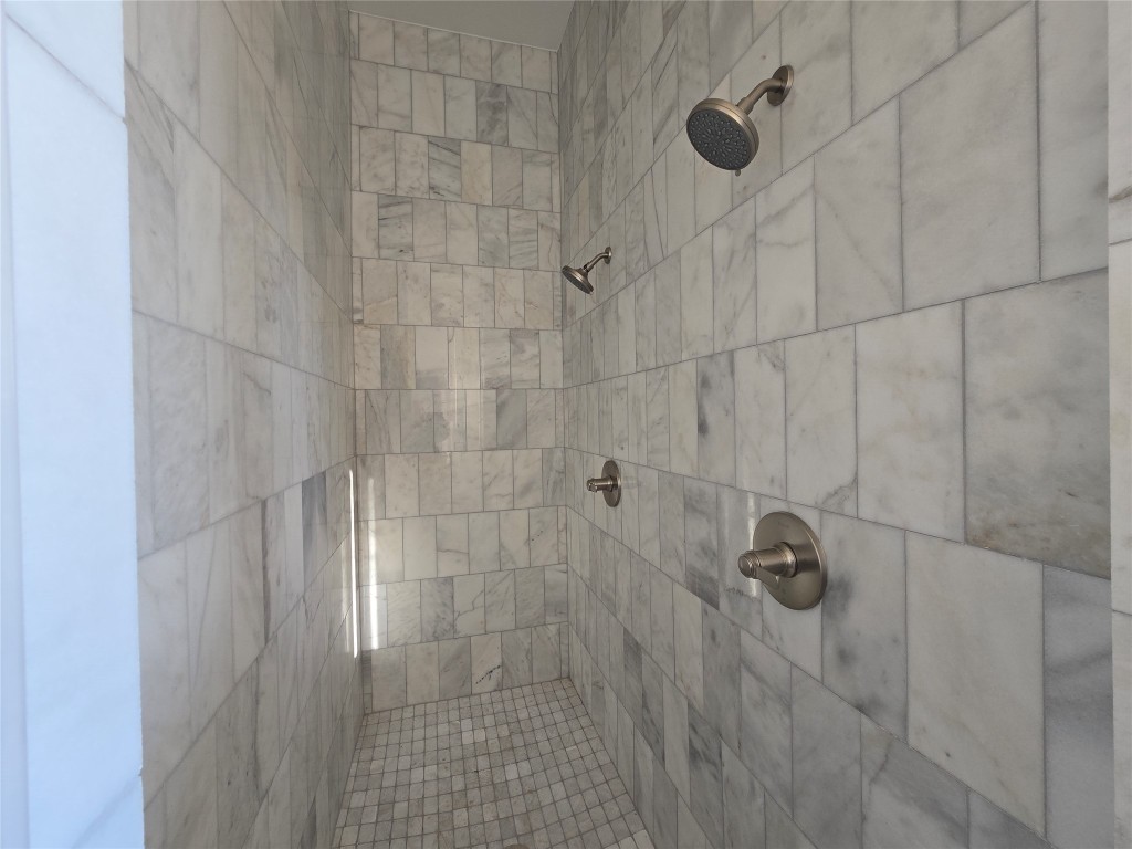 15408 Highlander Court Montgomery, TX 77356 - Photo 22 of 35 a bathroom with a shower