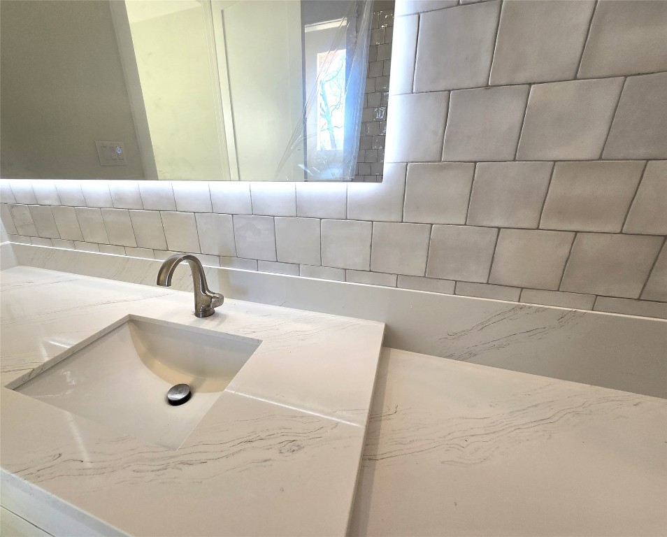15408 Highlander Court Montgomery, TX 77356 - Photo 23 of 35 a bathroom with a sink and a window