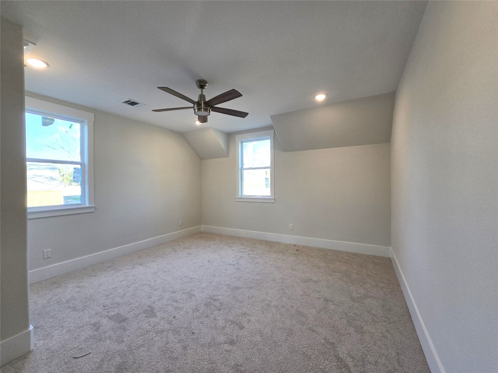 15408 Highlander Court Montgomery, TX 77356 - Photo 28 of 35 an empty room with a window and a fan