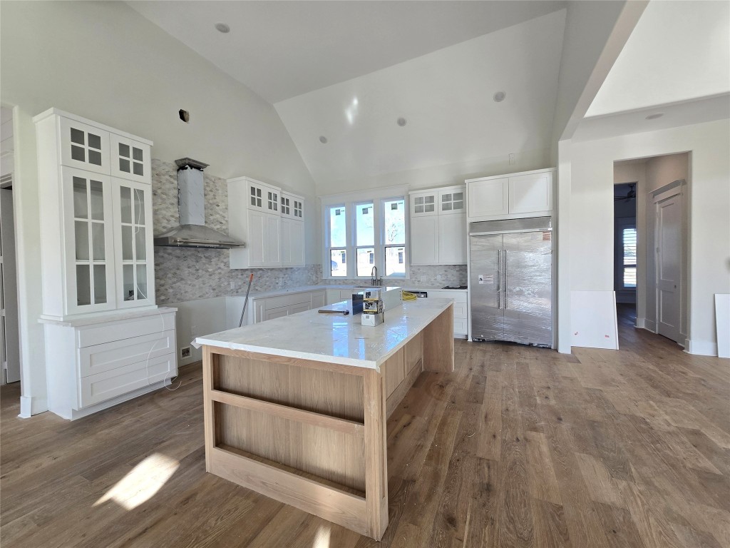 15408 Highlander Court Montgomery, TX 77356 - Photo 10 of 35 a large white kitchen with cabinets