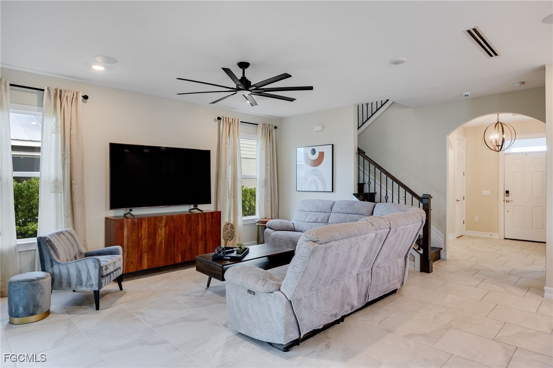 16549 Timber Lane Punta Gorda, FL 33982 - Photo 12 of 30 a living room with furniture and a flat screen tv