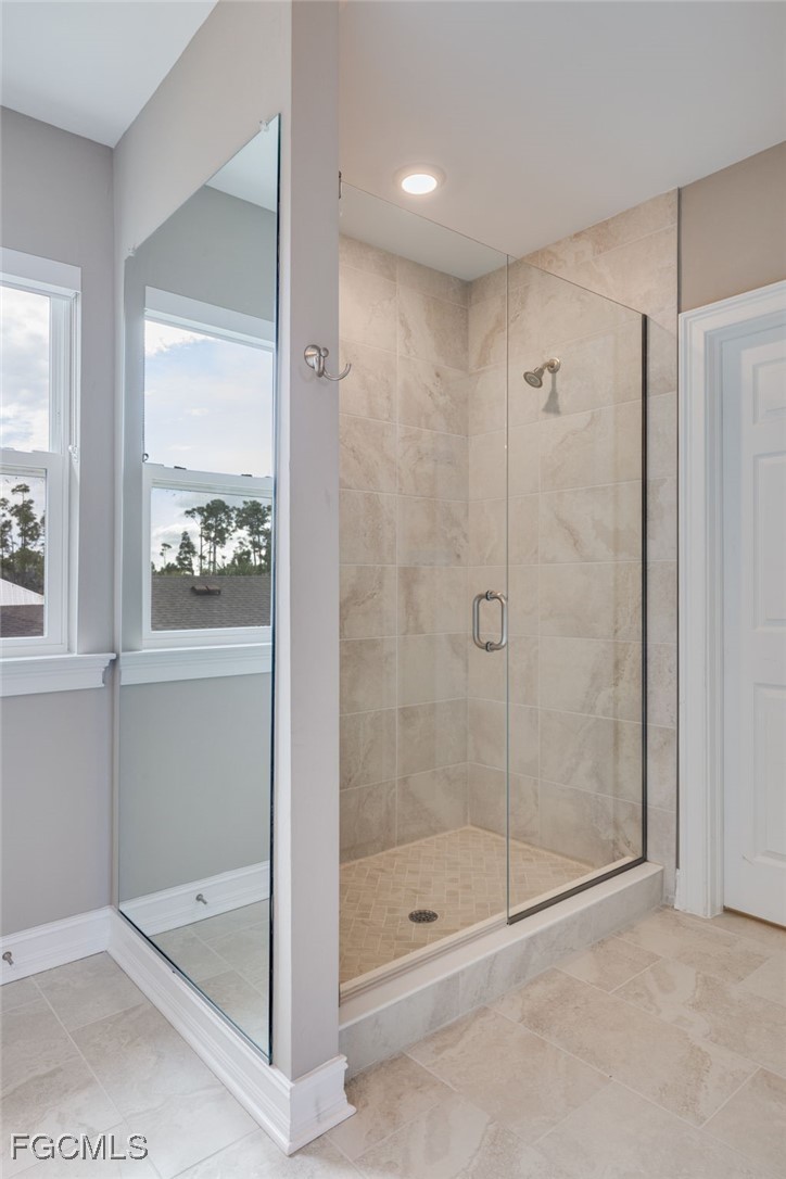 16549 Timber Lane Punta Gorda, FL 33982 - Photo 19 of 30 a bathroom with a shower