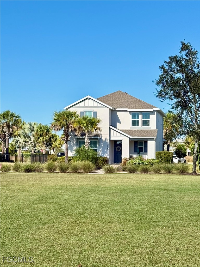 16549 Timber Lane Punta Gorda, FL 33982 - Photo 2 of 30 a front view of house with yard and green space