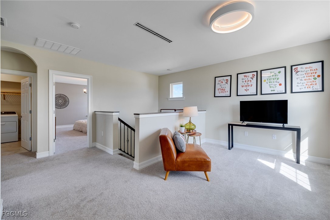 16549 Timber Lane Punta Gorda, FL 33982 - Photo 22 of 30 a living room with furniture and a flat screen tv