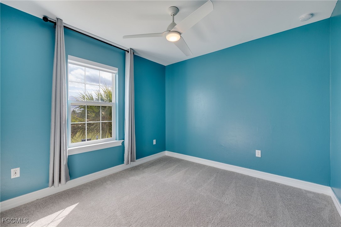 16549 Timber Lane Punta Gorda, FL 33982 - Photo 23 of 30 an empty room with windows and closet