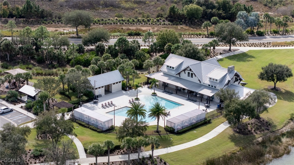16549 Timber Lane Punta Gorda, FL 33982 - Photo 30 of 30 an aerial view of a house with garden space and lake view