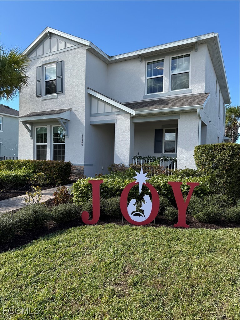 16549 Timber Lane Punta Gorda, FL 33982 - Photo 9 of 30 a front view of a house with yard