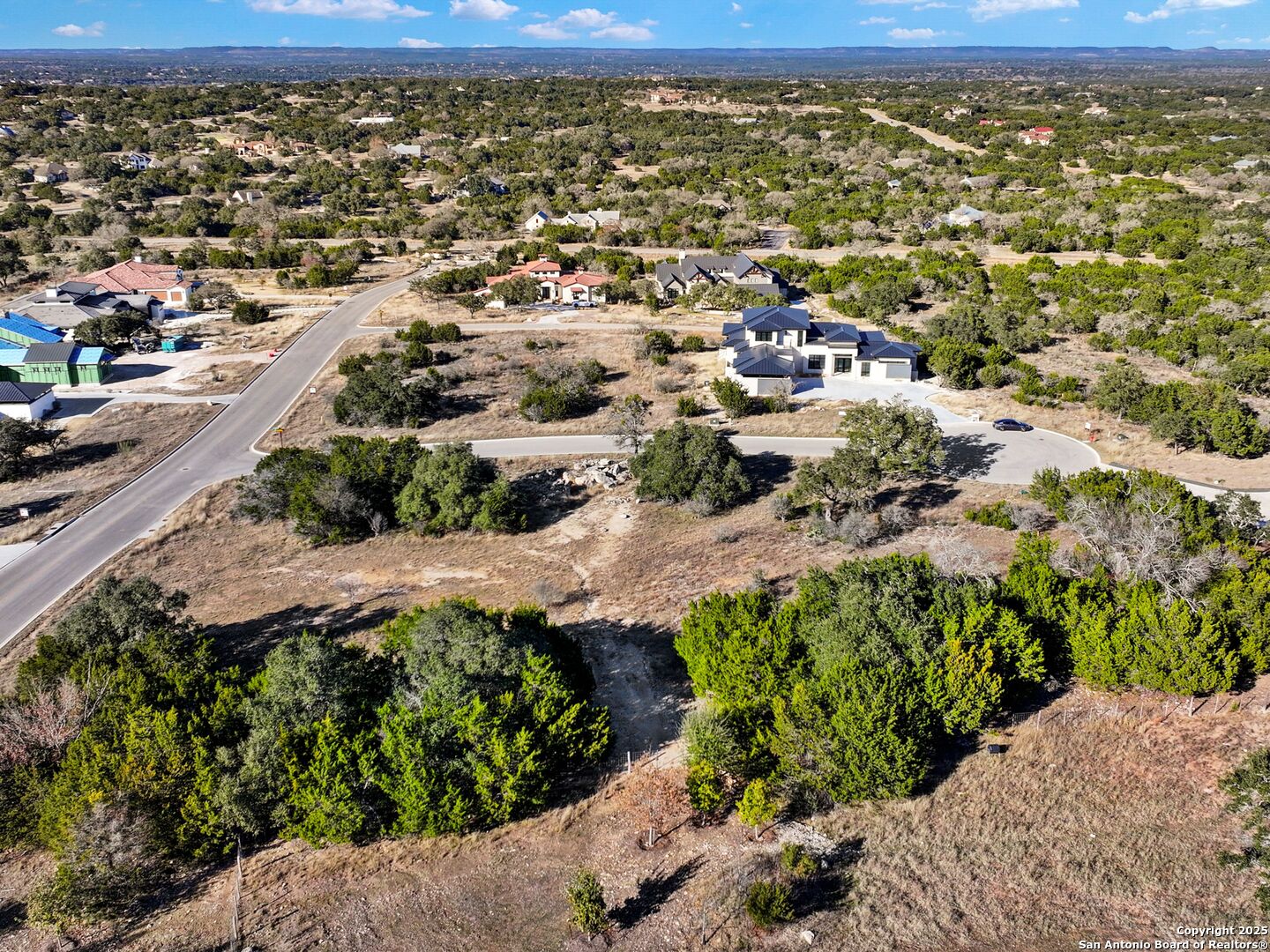 18 Meridian Boerne, TX 78006 - Photo 3 of 11 an aerial view of residential houses with outdoor space