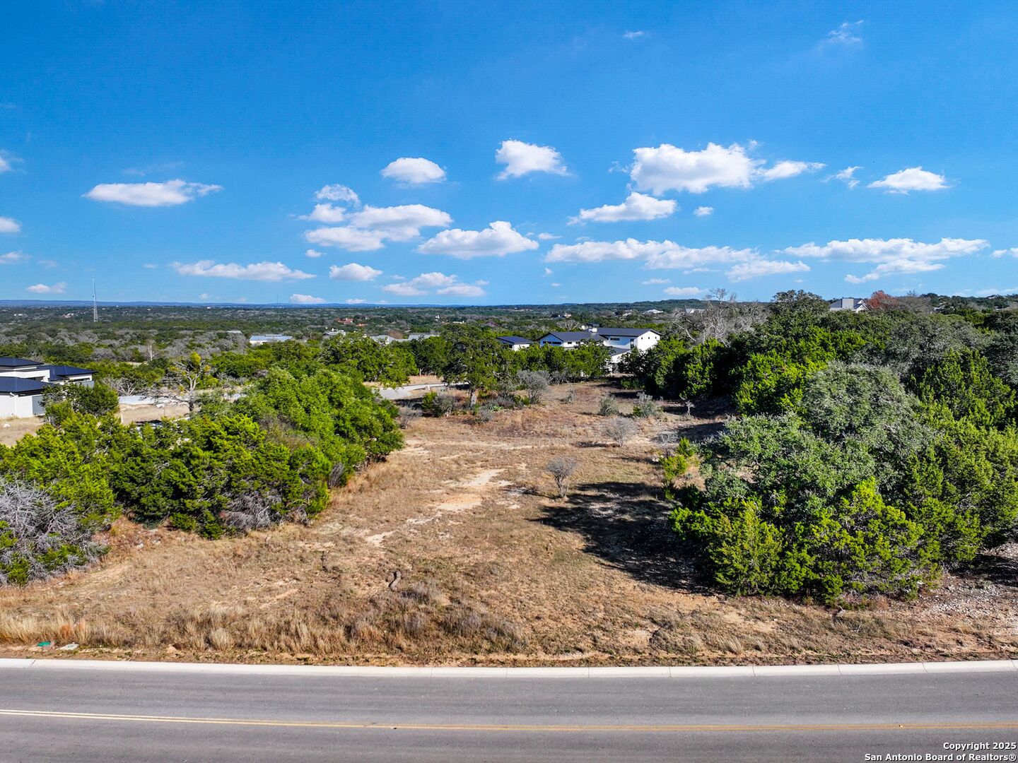 18 Meridian Boerne, TX 78006 - Photo 7 of 11 a view of a lake with a city