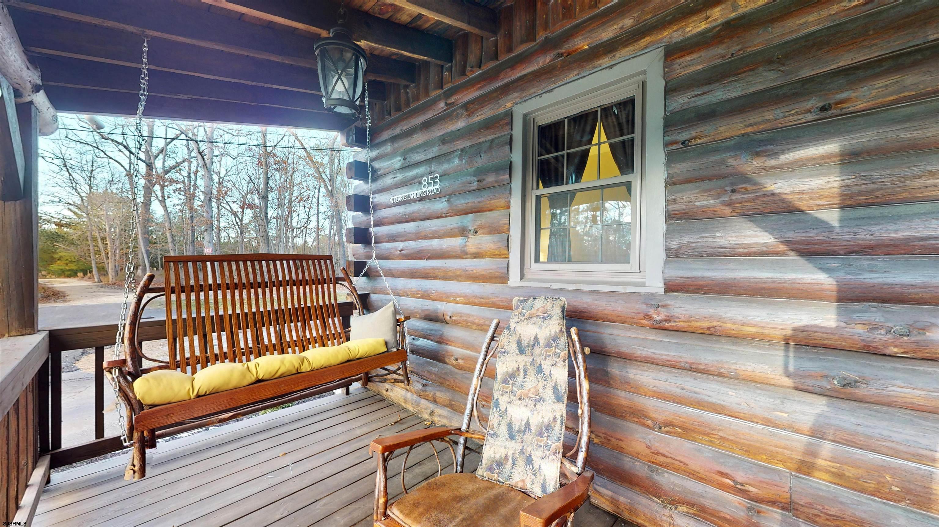 853 West Clarks Landing Road Galloway Township, NJ 08215 - Photo 16 of 64 a view of a porch with wooden floor and outdoor space