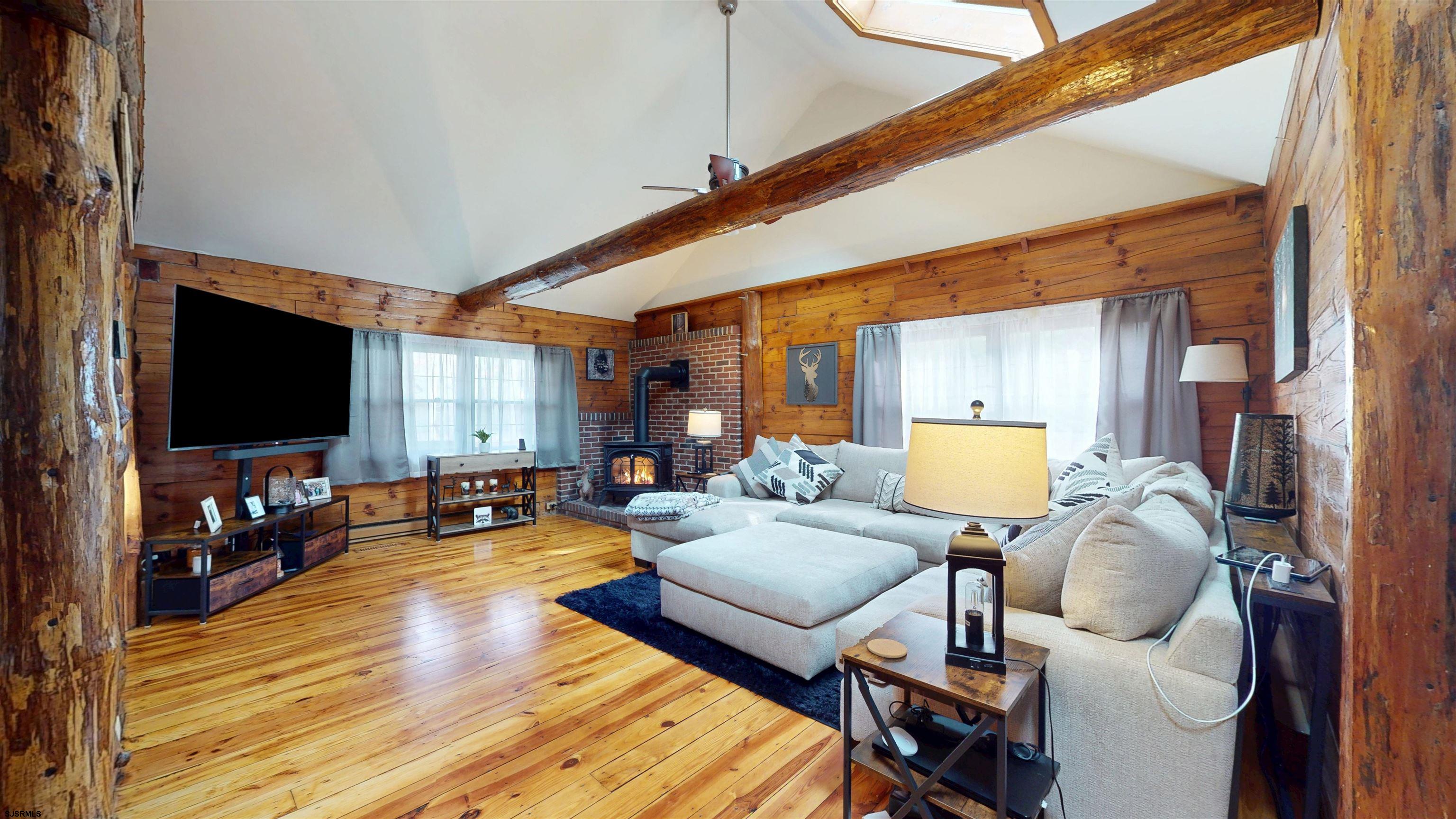 853 West Clarks Landing Road Galloway Township, NJ 08215 - Photo 28 of 64 a living room with furniture and a flat screen tv