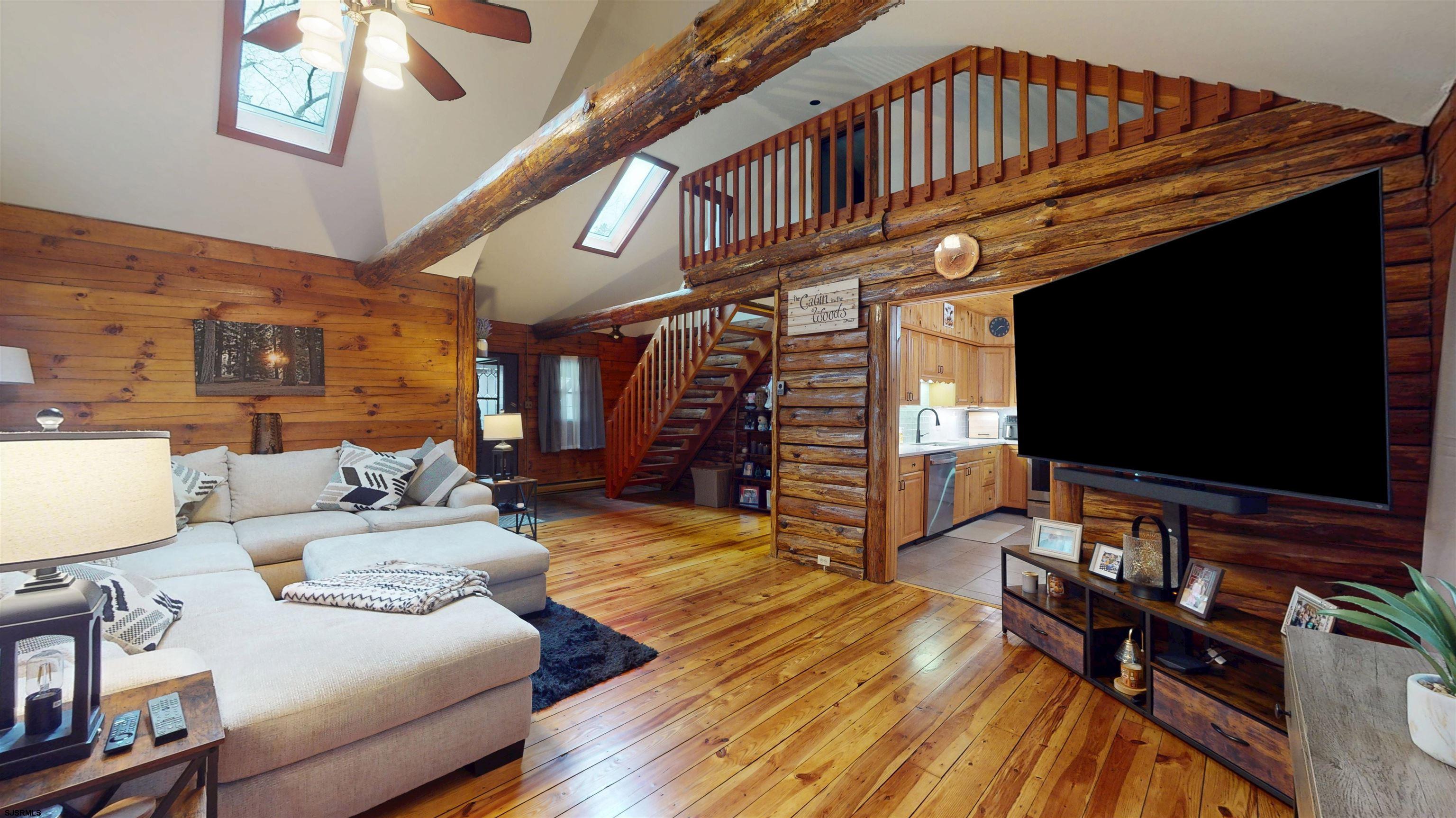 853 West Clarks Landing Road Galloway Township, NJ 08215 - Photo 30 of 64 a living room with furniture and a flat screen tv