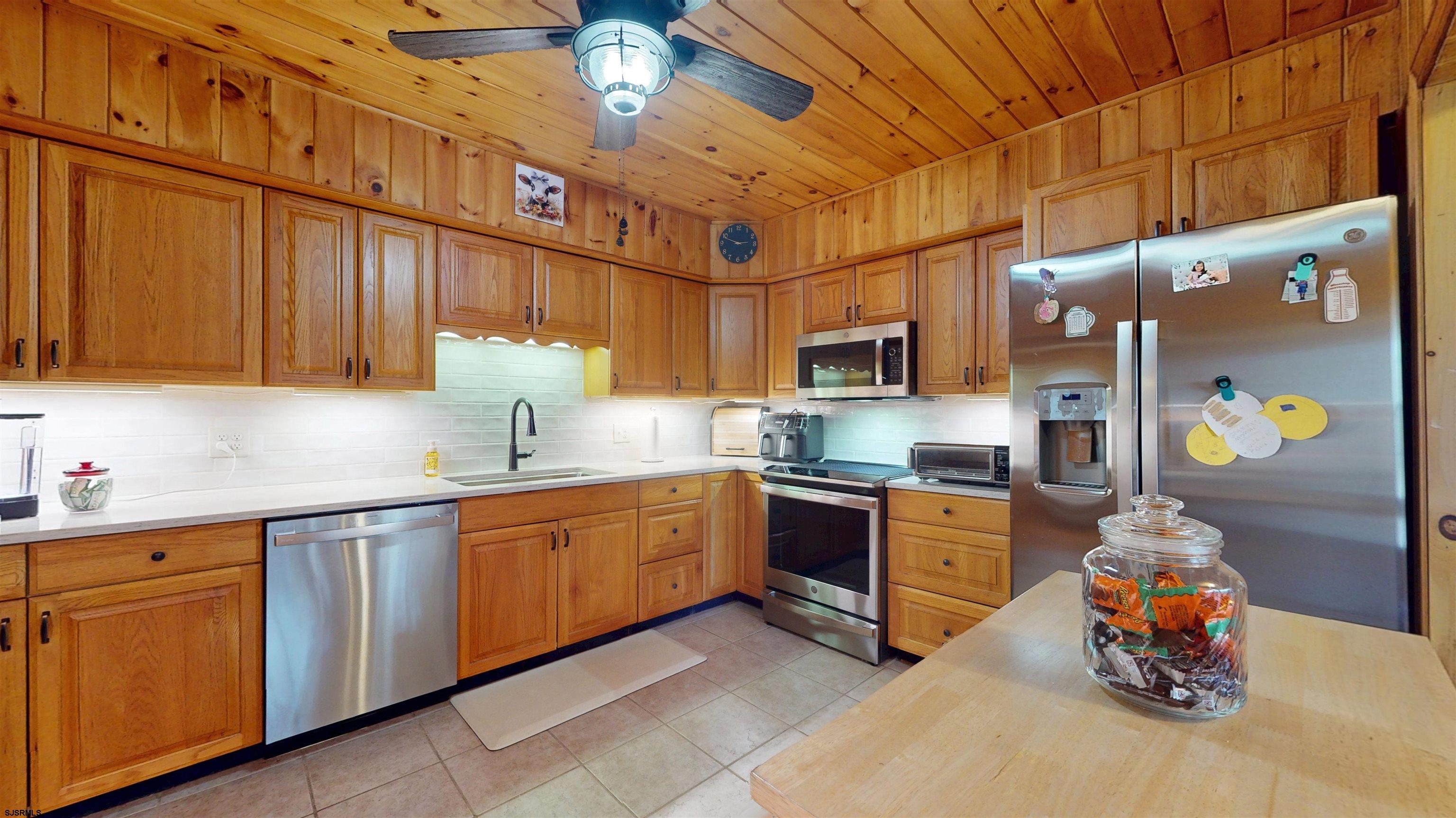 853 West Clarks Landing Road Galloway Township, NJ 08215 - Photo 38 of 64 a kitchen with stainless steel appliances granite countertop a sink and cabinets