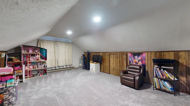 a view of a garage with parked cars