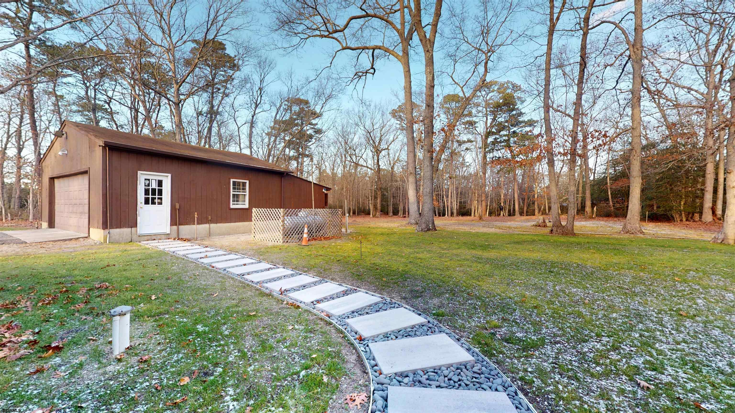 853 West Clarks Landing Road Galloway Township, NJ 08215 - Photo 58 of 64 a view of a house with a yard
