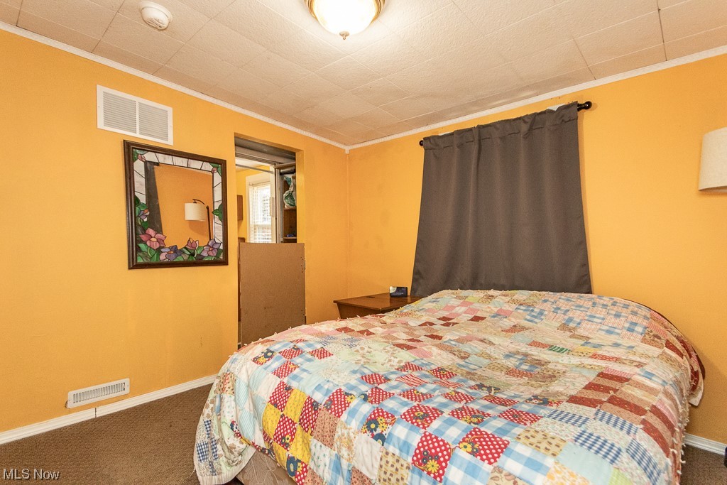 11038 Prouty Road Painesville, OH 44077 - Photo 15 of 24 Carpeted bedroom