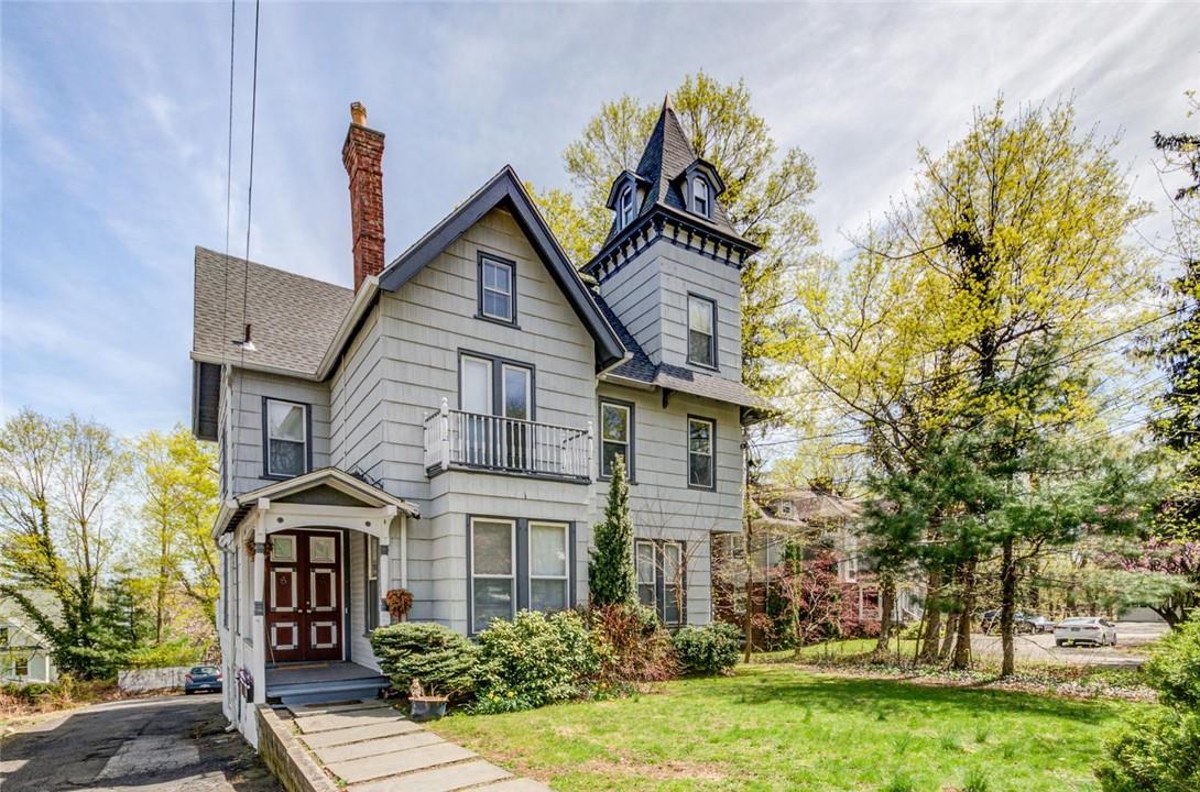 169 South Broadway Nyack, NY 10960 - Photo 1 of 1 a front view of a house with a garden