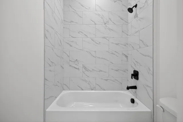 a bathroom with a bathtub