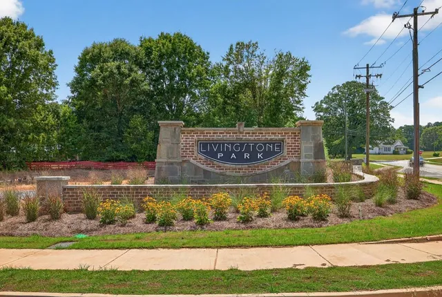 a view of outdoor space with swimming pool and lake view