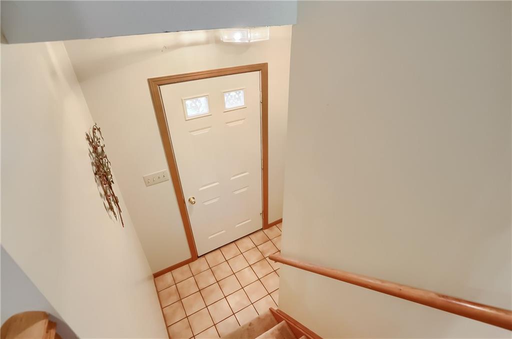 9250 Highland Road Pittsburgh, PA 15237 - Photo 13 of 25 The front entry is split between the main floor and the basement and garage.