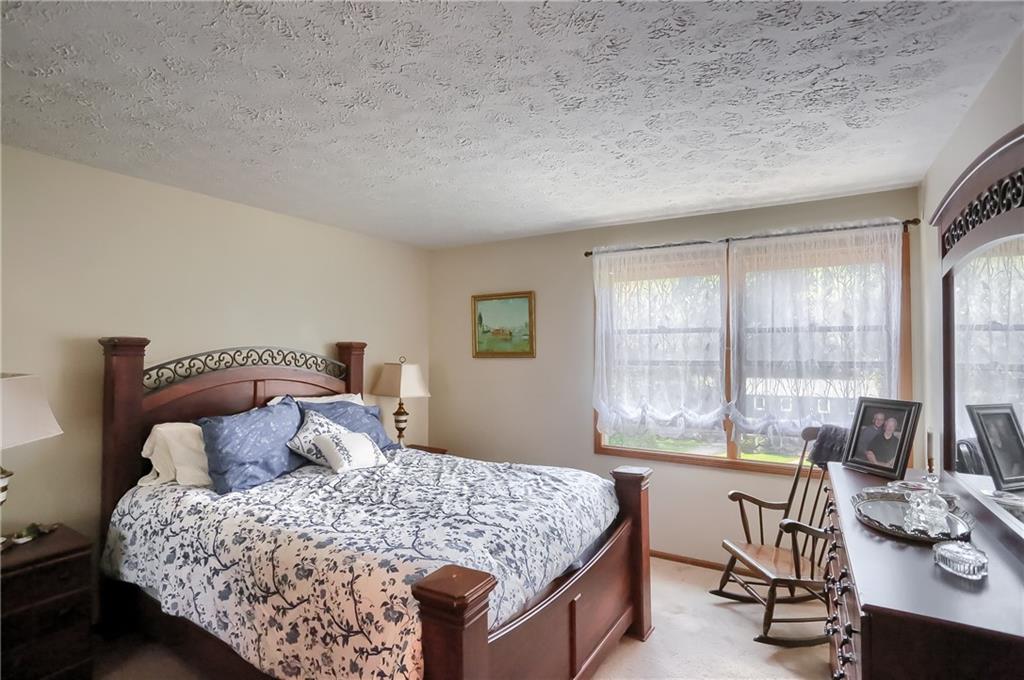 9250 Highland Road Pittsburgh, PA 15237 - Photo 14 of 25 The master bedroom is very spacious. The double window allows in a lot of natural light.