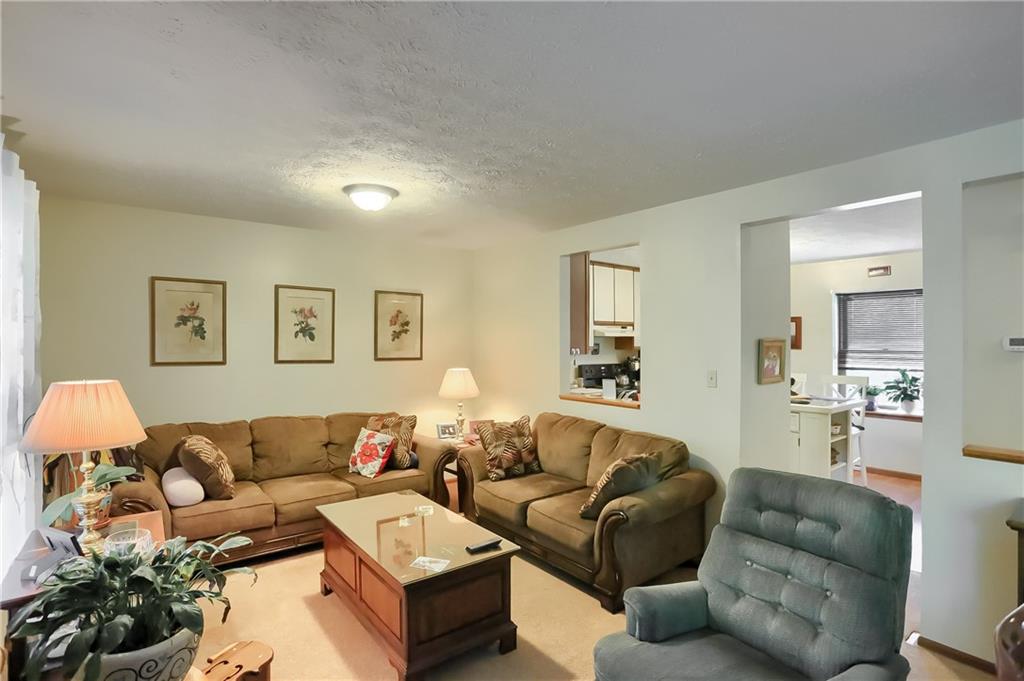 9250 Highland Road Pittsburgh, PA 15237 - Photo 3 of 25 There is a pass through from the kitchen into the living/dining area.