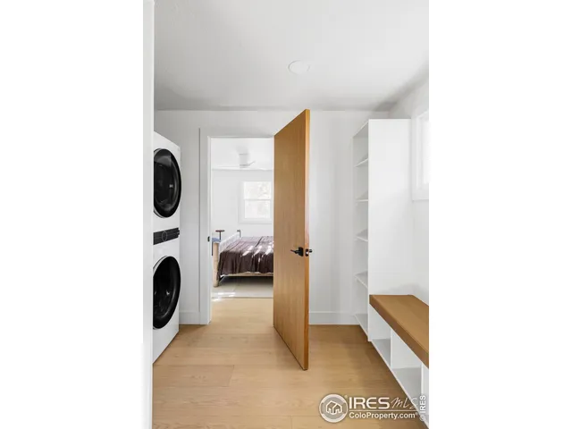 a view of a living room with furniture and a window