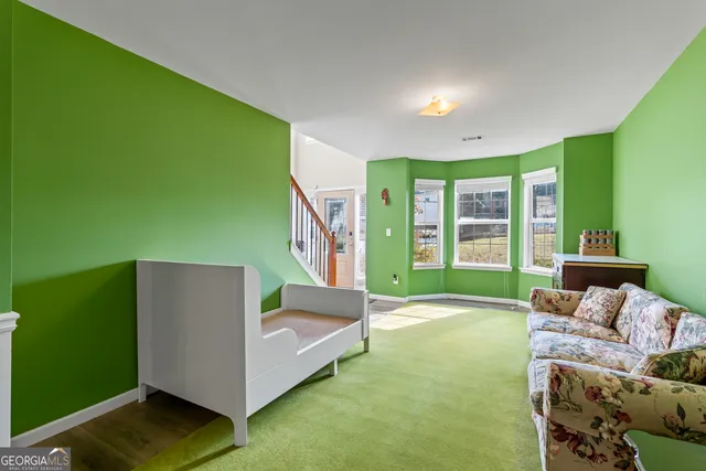 a kitchen with granite countertop a sink and a window