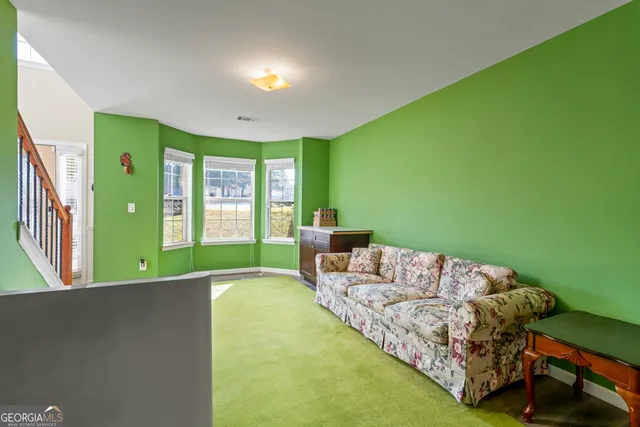 a kitchen with stainless steel appliances granite countertop a stove and cabinets