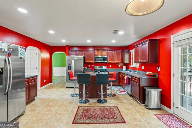 a view of balcony with wooden floor and outdoor seating