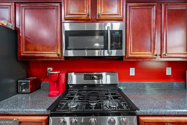a view of a hallway with wooden shelves
