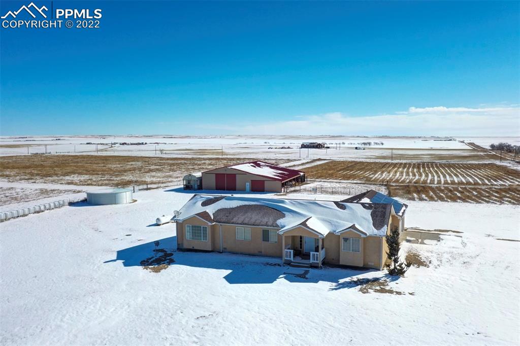 31550 Sanborn Road Yoder, CO 80864 - Photo 3 of 50 a view of houses with outdoor space