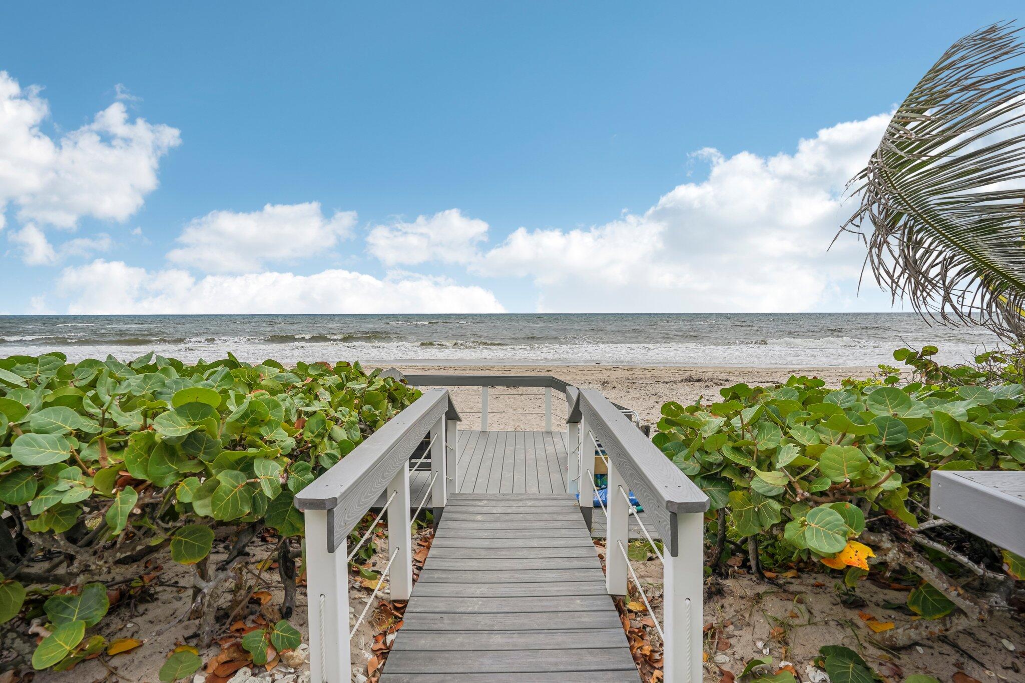 5540 North Ocean Boulevard, Unit 212 Ocean Ridge, FL 33435 - Photo 1 of 41 a view of a balcony with an ocean view