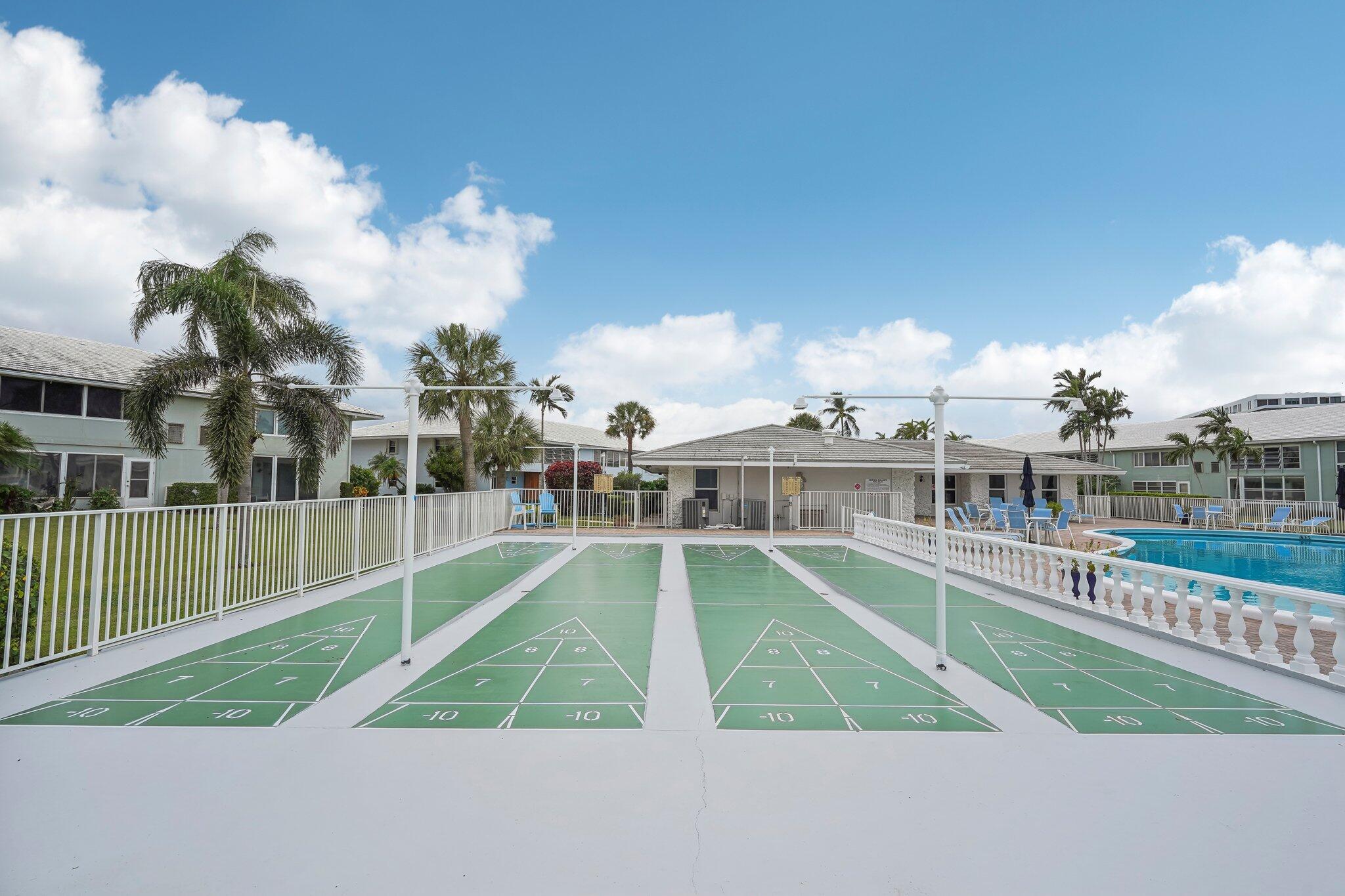5540 North Ocean Boulevard, Unit 212 Ocean Ridge, FL 33435 - Photo 29 of 41 a view of a swimming pool and a terrace