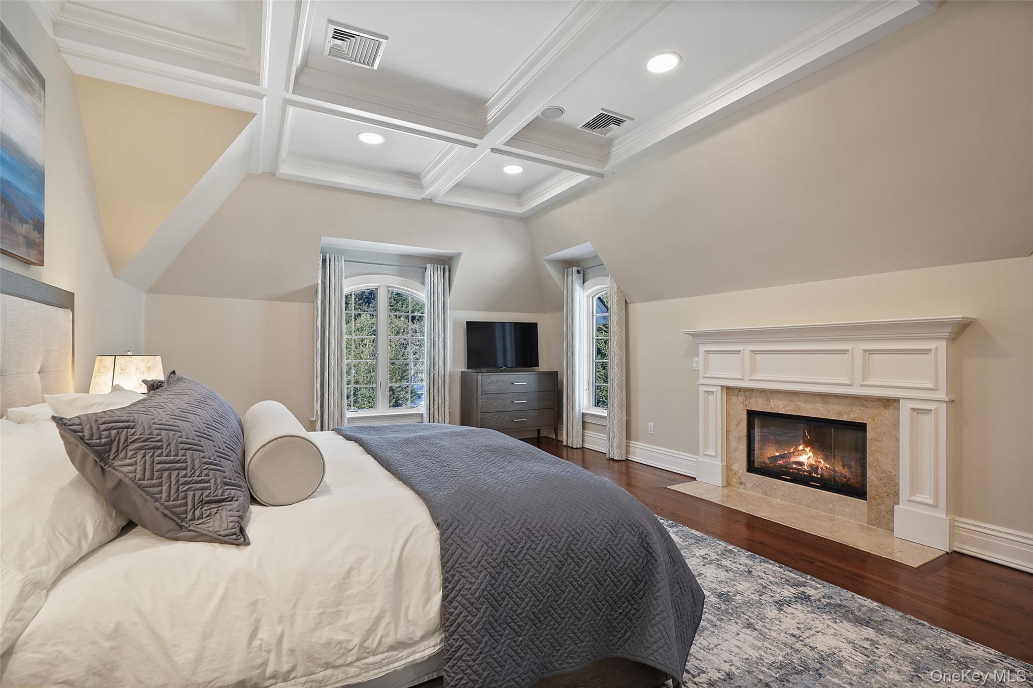 26 Hollow Ridge Road Bedford Corners, NY 10549 - Photo 15 of 39 a bedroom with a bed and a fireplace