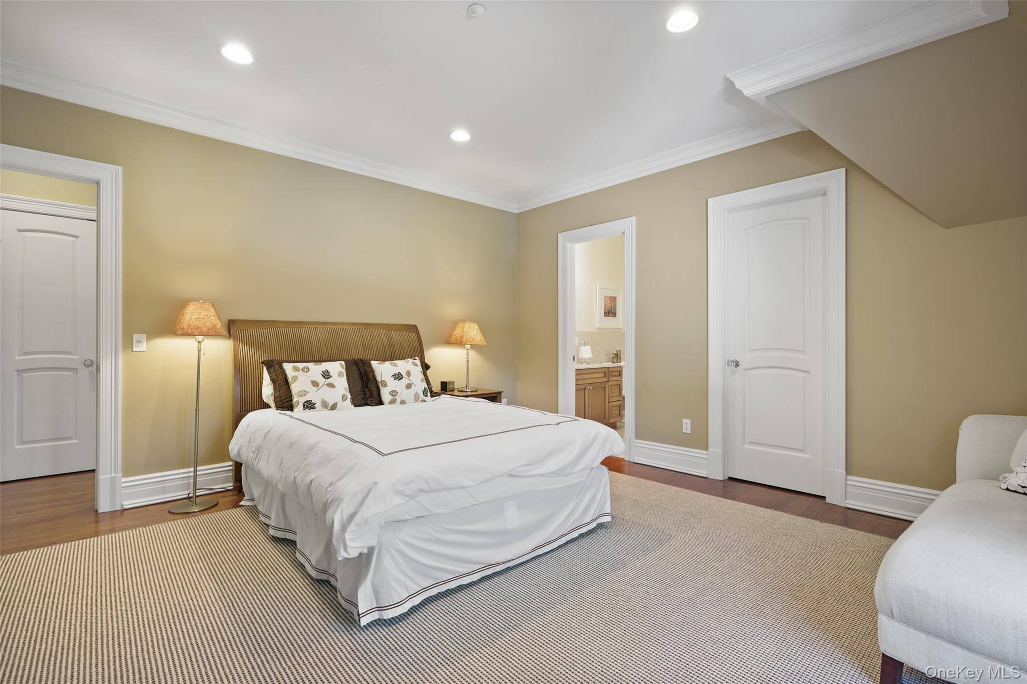 26 Hollow Ridge Road Bedford Corners, NY 10549 - Photo 21 of 39 a spacious bedroom with a bed and a couch