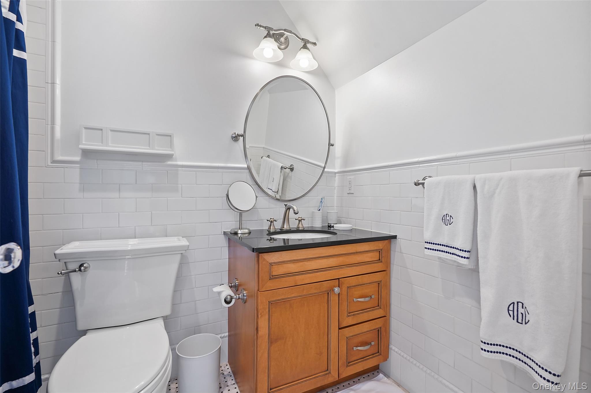 26 Hollow Ridge Road Bedford Corners, NY 10549 - Photo 24 of 39 a bathroom with a granite countertop toilet sink and mirror