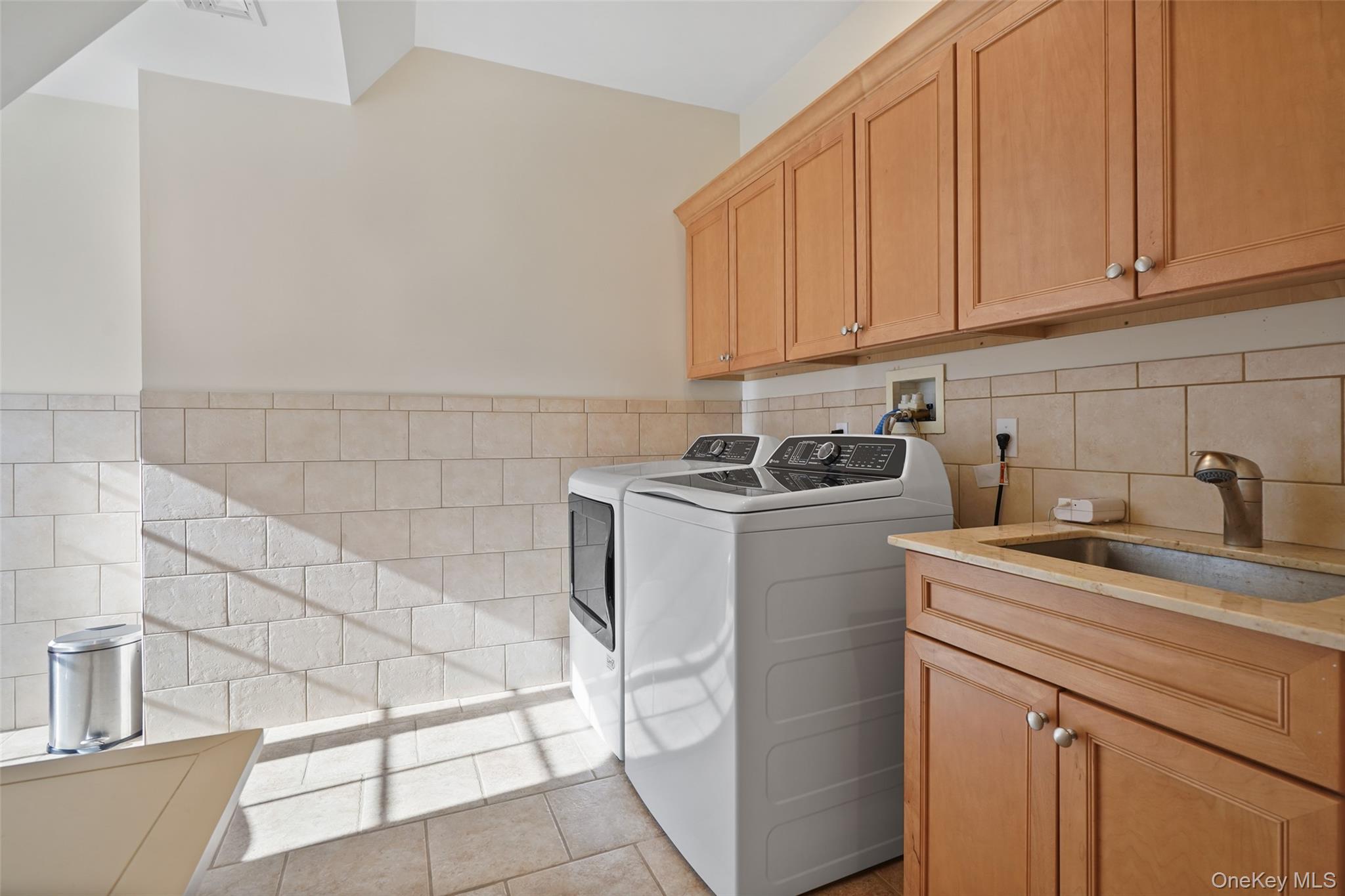 26 Hollow Ridge Road Bedford Corners, NY 10549 - Photo 27 of 39 a utility room with sink dryer and washer