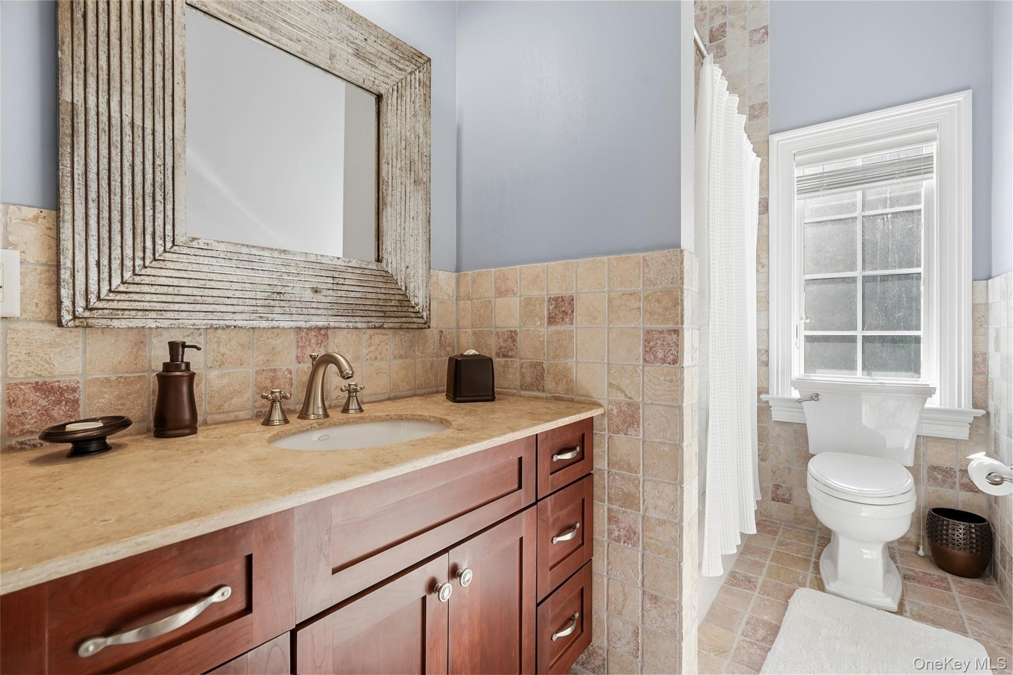 26 Hollow Ridge Road Bedford Corners, NY 10549 - Photo 30 of 39 a bathroom with a sink a toilet and a mirror