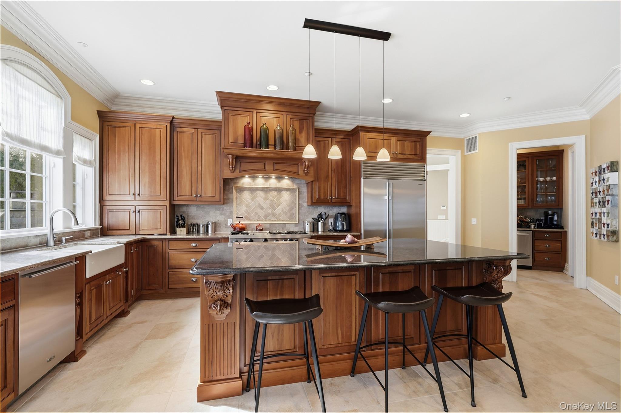 26 Hollow Ridge Road Bedford Corners, NY 10549 - Photo 4 of 39 a kitchen with stainless steel appliances granite countertop counter space a sink and cabinets