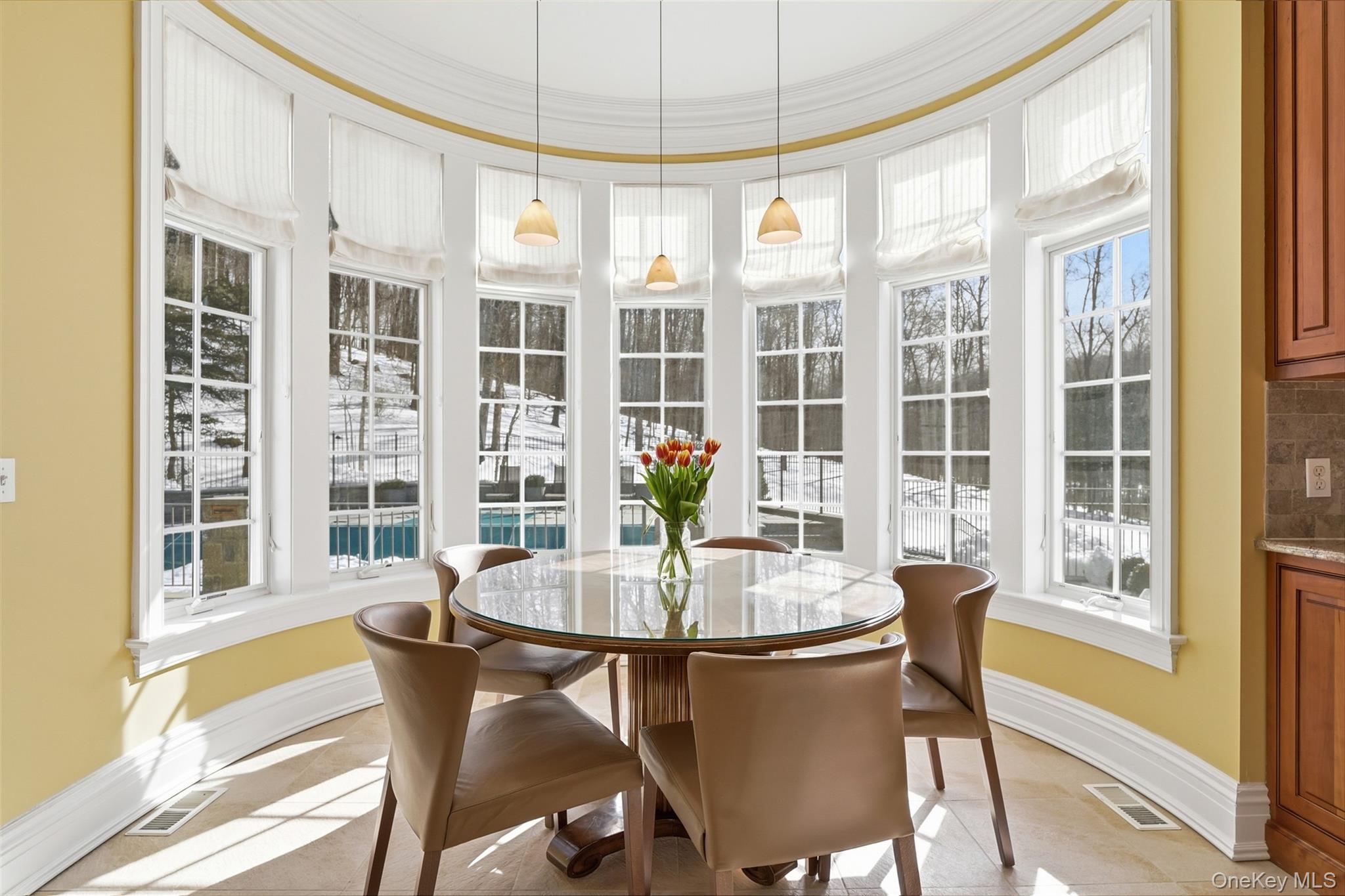 26 Hollow Ridge Road Bedford Corners, NY 10549 - Photo 6 of 39 a view of a dining room with furniture windows and wooden floor