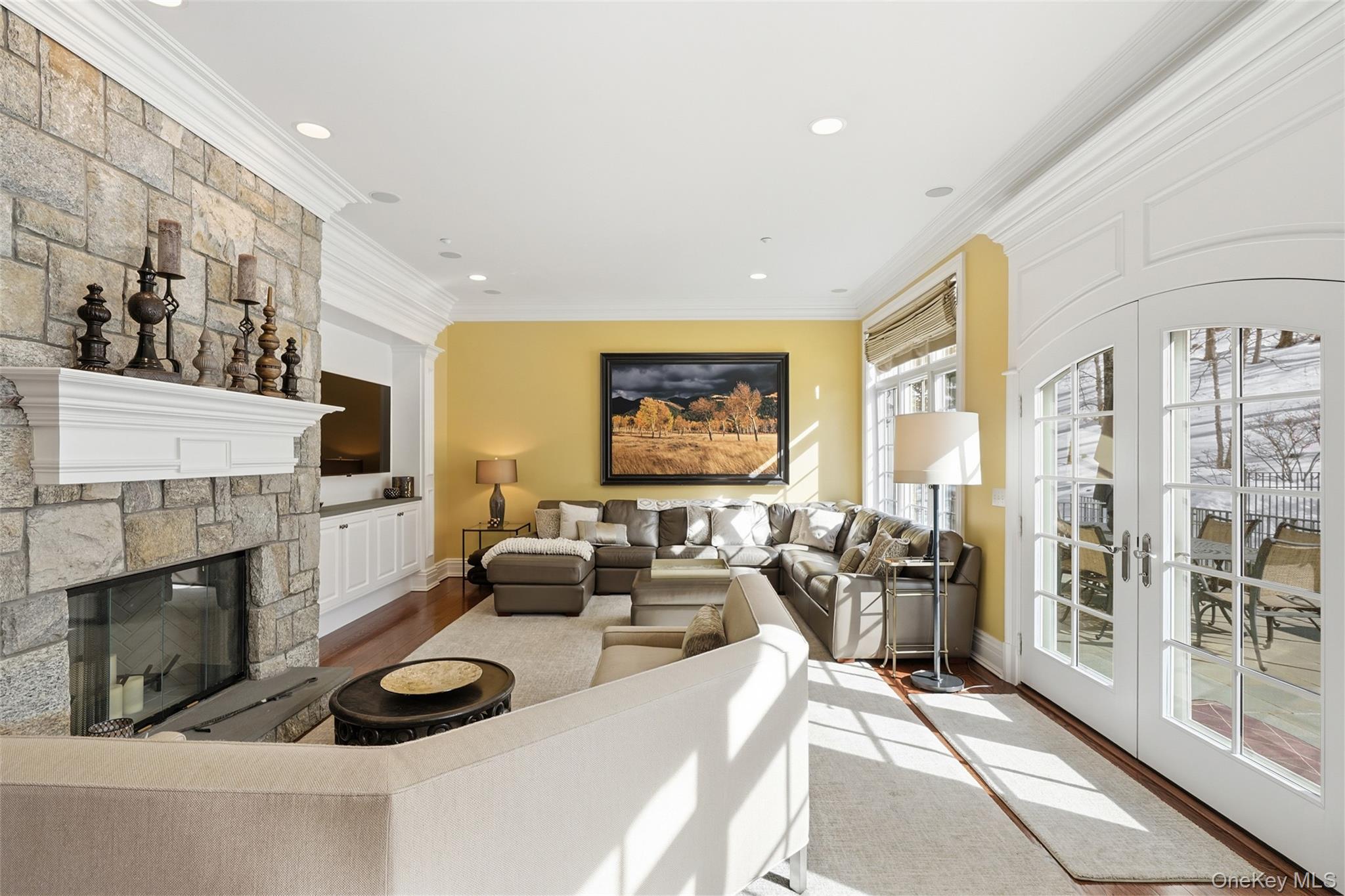 26 Hollow Ridge Road Bedford Corners, NY 10549 - Photo 9 of 39 a living room with furniture a fireplace and a large window