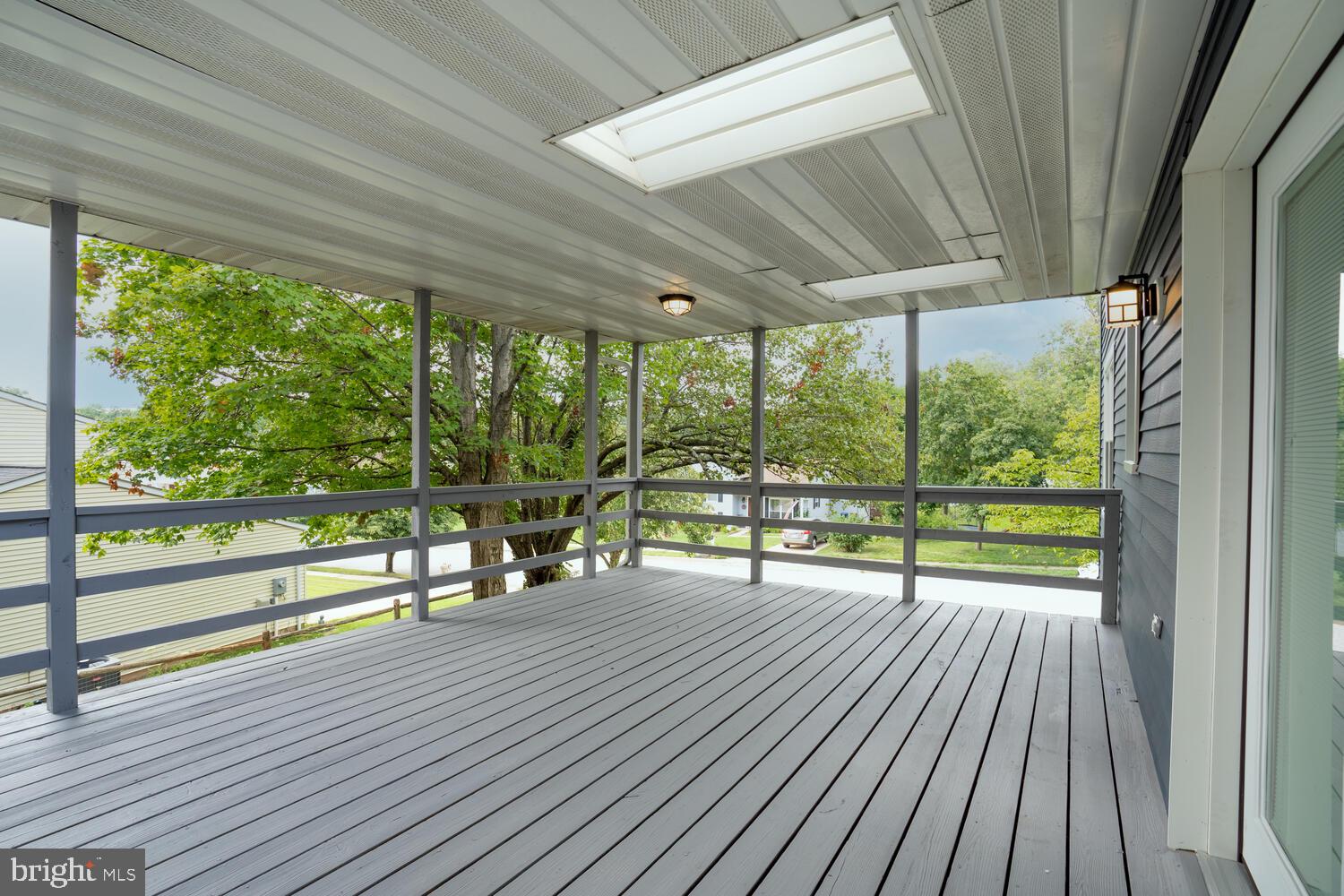 9020 Moonstone Road Baltimore, MD 21236 - Photo 2 of 30 a view of railway station with wooden floor and outdoor space