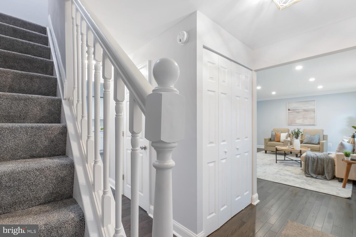9020 Moonstone Road Baltimore, MD 21236 - Photo 3 of 30 a view of a livingroom with furniture and stairs