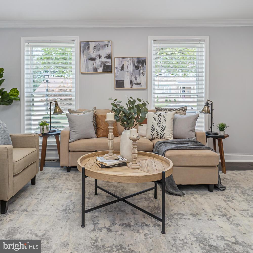 9020 Moonstone Road Baltimore, MD 21236 - Photo 6 of 30 a living room with furniture and a large window