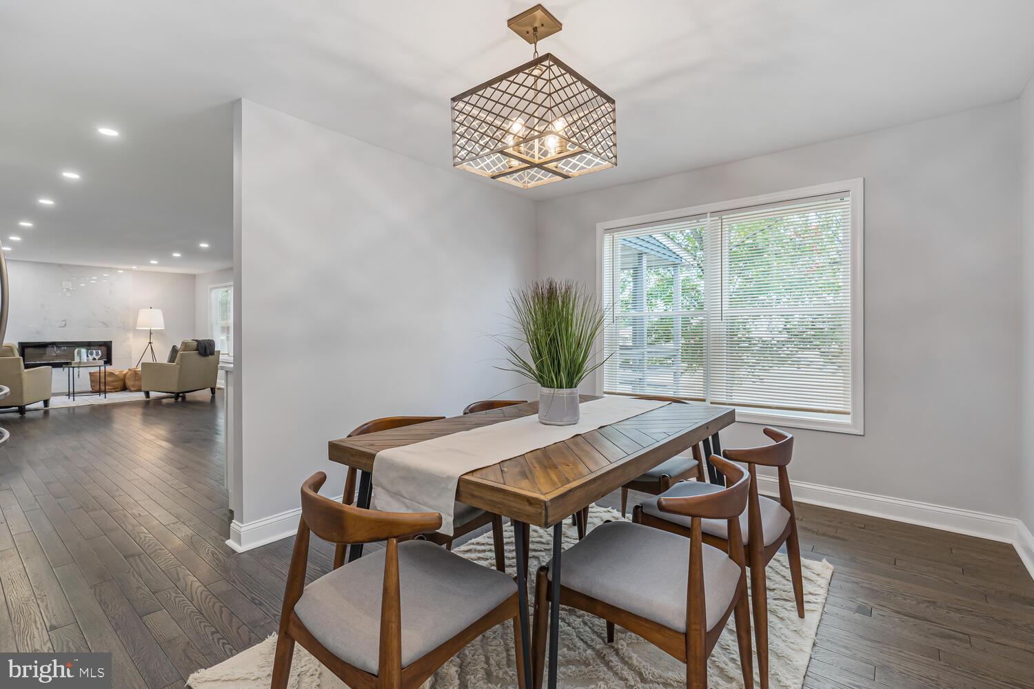 9020 Moonstone Road Baltimore, MD 21236 - Photo 9 of 30 a view of a dining room with furniture window and wooden floor
