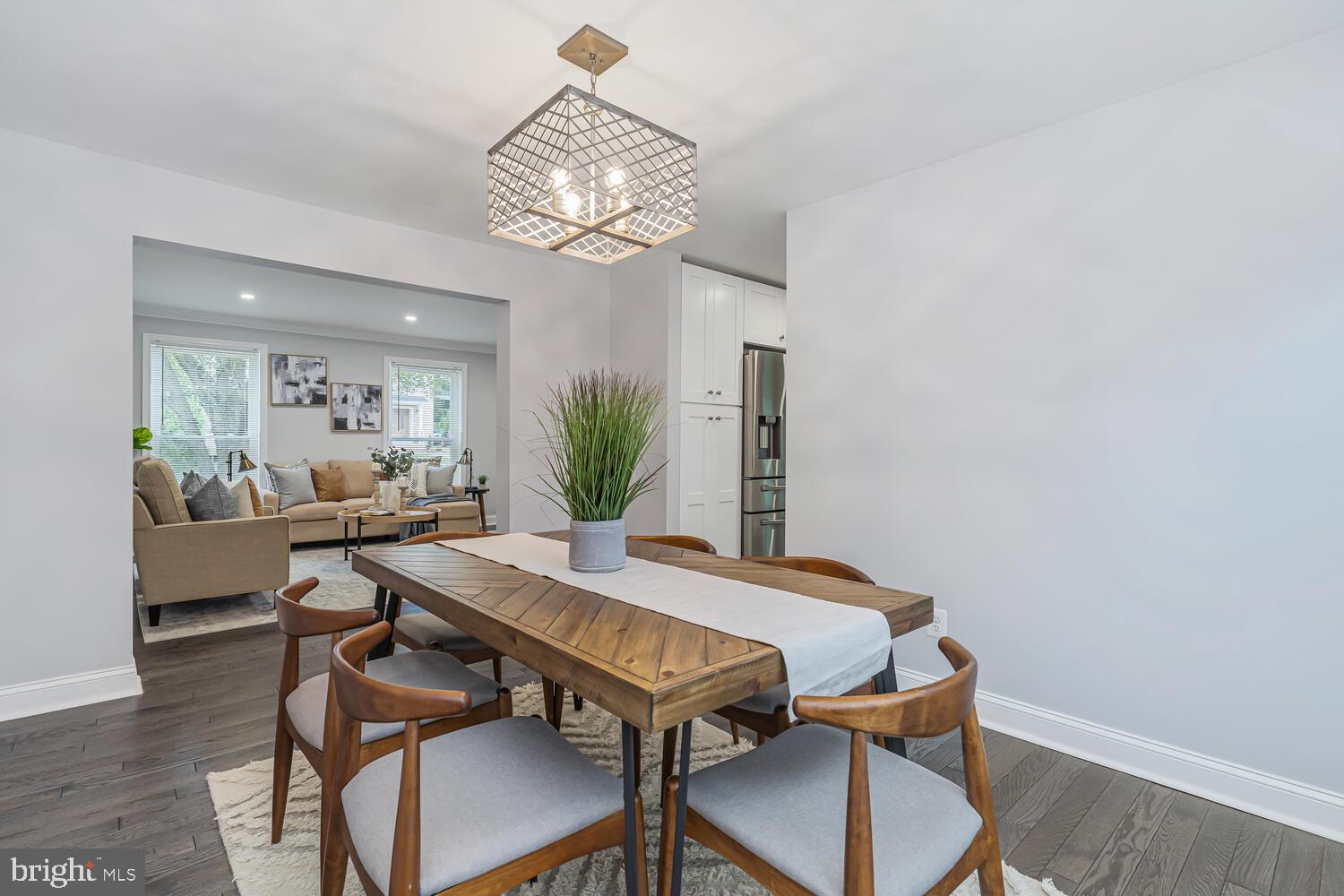 9020 Moonstone Road Baltimore, MD 21236 - Photo 10 of 30 a view of a dining room with furniture and wooden floor