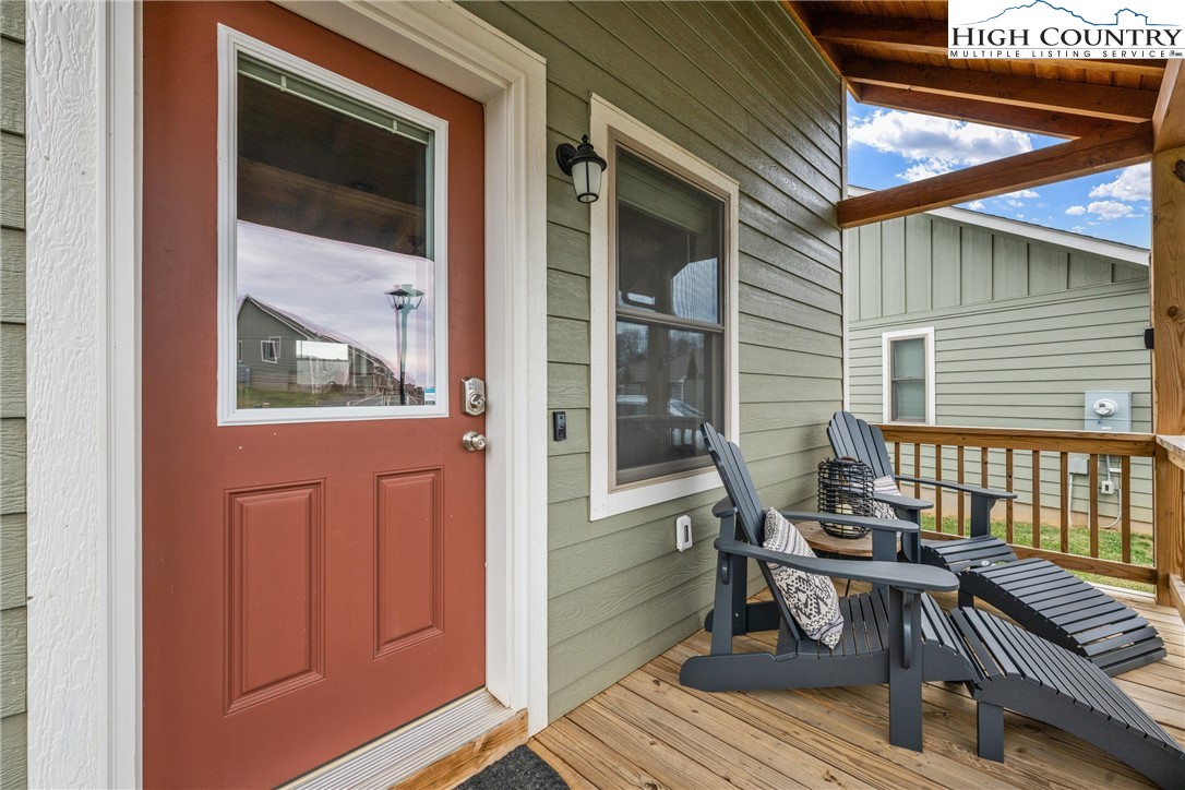 513 Townhomes Place, Unit 27 Boone, NC 28607 - Photo 27 of 33 a view of a two chairs in the balcony